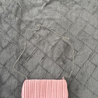 Pink clutch with chain strap