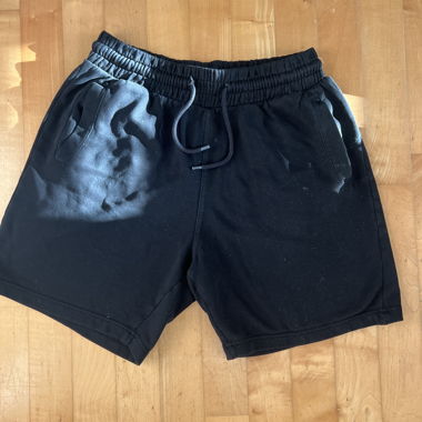 black mid length shorts