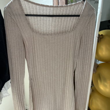 Pull long en maille côtelée