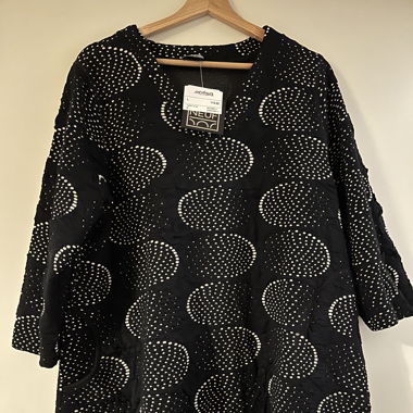 Neue dunkle Tunika zu kaufen!