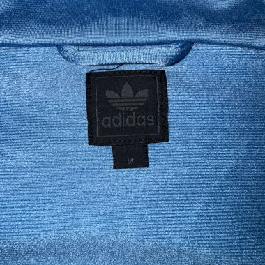 Giacca adidas azzurra chiara