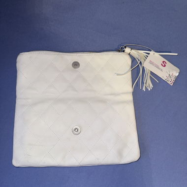 White clutch with tassel