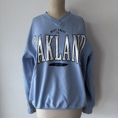Felpa H&M "Oakland" azzurro chiaro Tg. 170