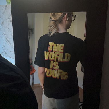 Black graphic T-shirt "The World Is Ours"