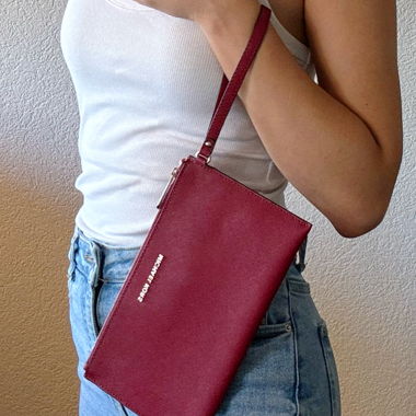 Michael Kors leather clutch bag