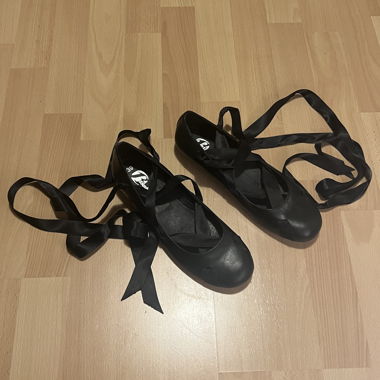 Schwarze Ballerinas