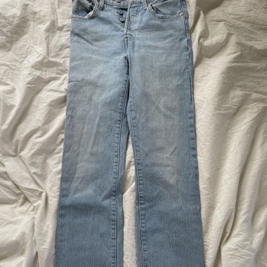 High-waisted light wash straight leg Levi's jeans 