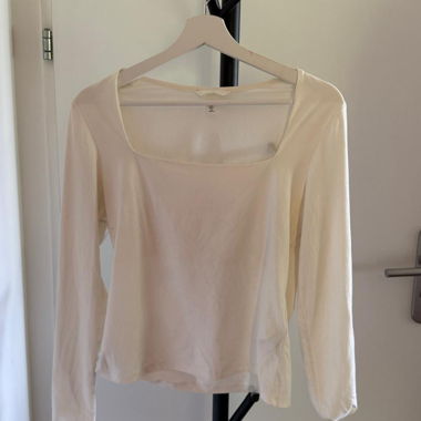 Top bianco a maniche lunghe