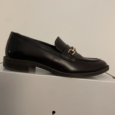 Black leather loafers