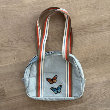 Borsa a tracolla con farfalle