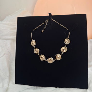 Gold Necklace with Sun Motif