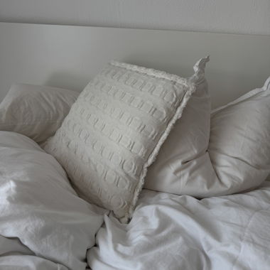 Coussin décoratif texturé