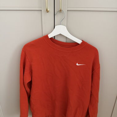 Orange Nike sweatshirt