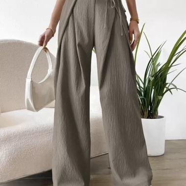Pantaloni larghi beige in tessuto con vita alta