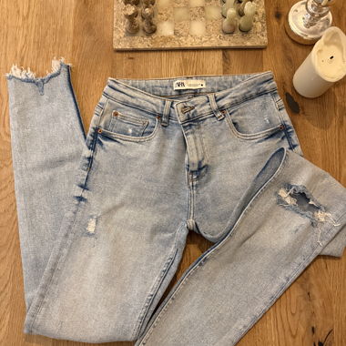 Jeans strappati