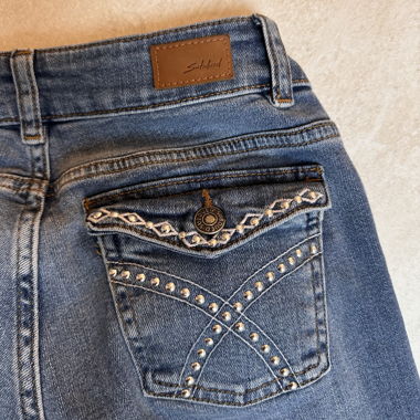 Subdued low rise flare jeans worn once 
