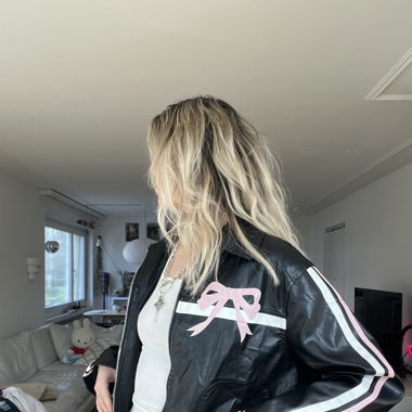 faux leather jacket with bows