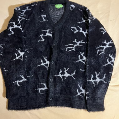 Cardigan nero soffice con motivo