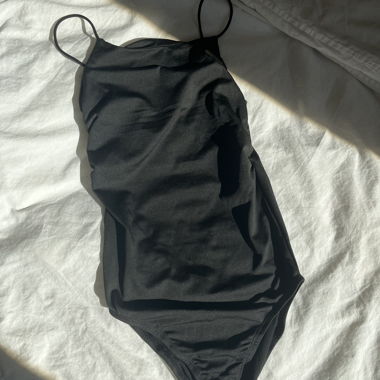 Black bodysuit with spaghetti straps