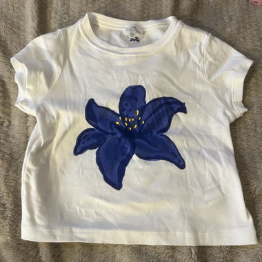 White crop top with blue flower