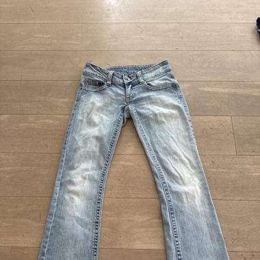 Lange blaue Jeanshose