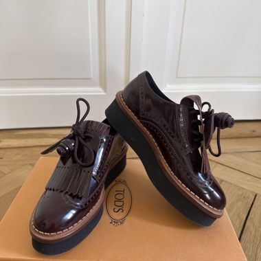 Mocassini Tod's Classic Kiltie con nappine