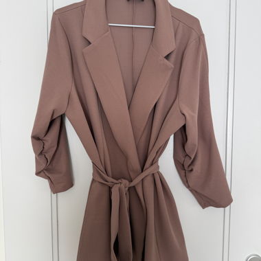 Pink blazer with tie belt