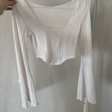 Top a maniche lunghe a coste bianco