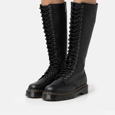 Knee-high Dr. Martens boots