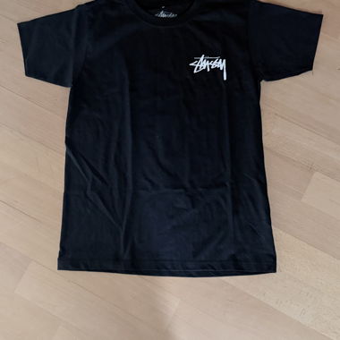 T-shirt grafica Stussy