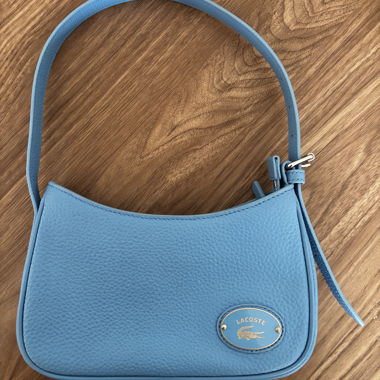 Borsa a tracolla Lacoste azzurro chiaro