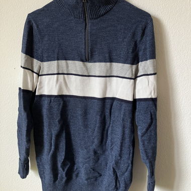 Blue knit sweater with half zipper