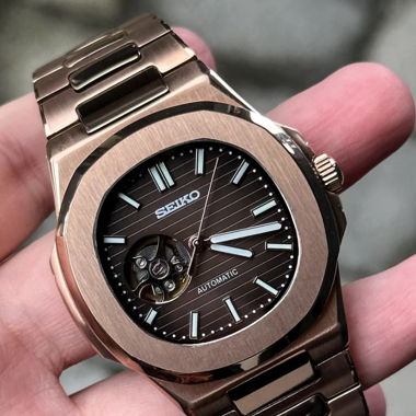 Rose Gold Open-Heart Zifferblatt NH35 Automatik - Geriffelte Lünette