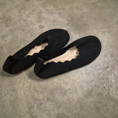 Schwarze Ballerinas aus Strick