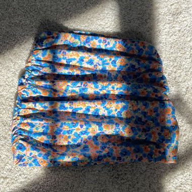 Floral ruched mini skirt
