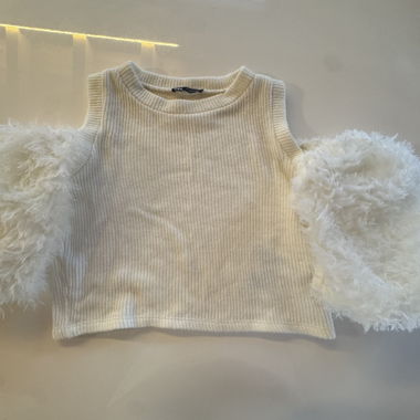 Top senza maniche color crema 