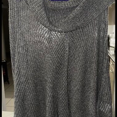 Poncho lavorato a maglia con frange