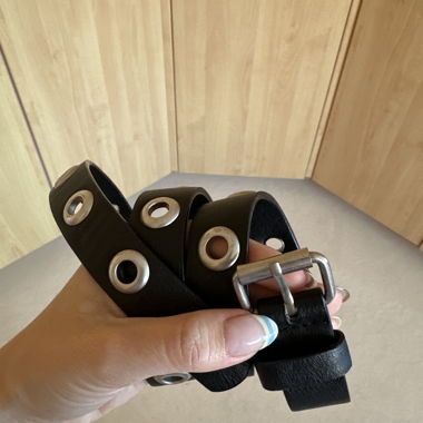 Black belt with eyelets
