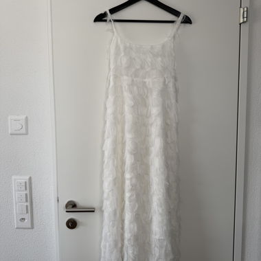 Weisses Federkleid