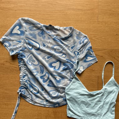 Two blue tops