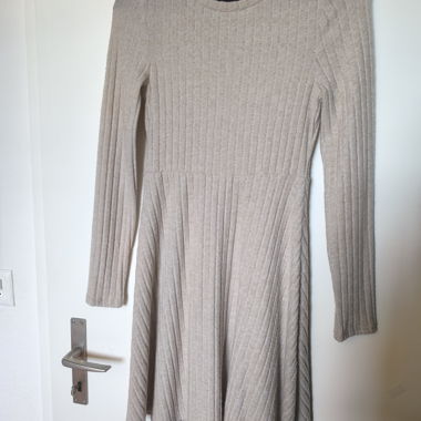 Beige knit dress with long sleeves