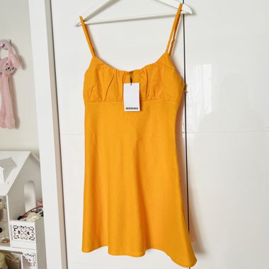 Intense orange dress from Bershka