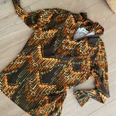 Top zip vintage con motivo