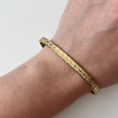 Gold-colored American bracelet