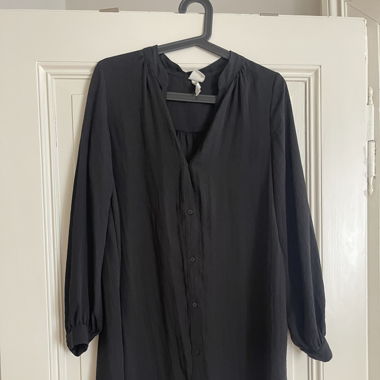 Schwarze lange Bluse 