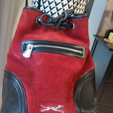 Red-black drawstring bag with shoulder strap