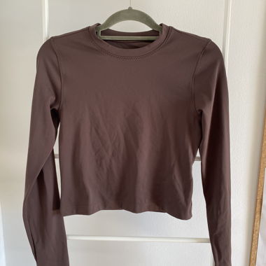 Brown Nike One Dri-Fit long sleeve crop top
