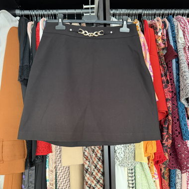 Black mini skirt with gold chain detail
