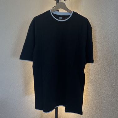 Black T-shirt with white trim