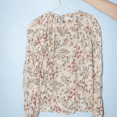 Blusa floreale con maniche a palloncino